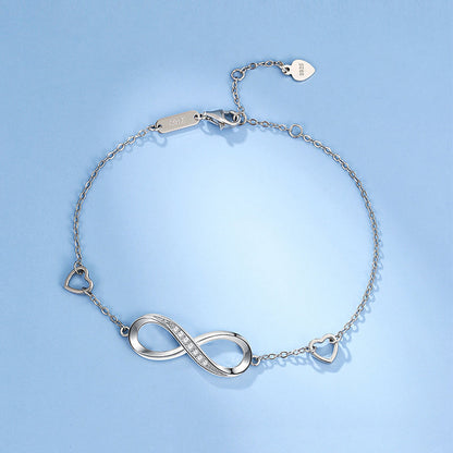 Éternelle™ | Bracelete Infinito Cravejado de Cristais e Corações Delicados